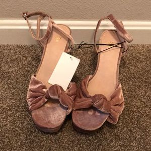 Pink suede pumps